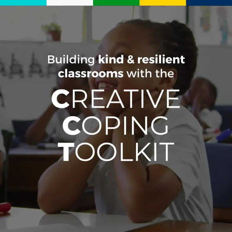 A girl at a classroom desk resting her chin on her hands and smiling, under the words “Building kind & resilient classrooms with the Creative Coping Toolkit.”